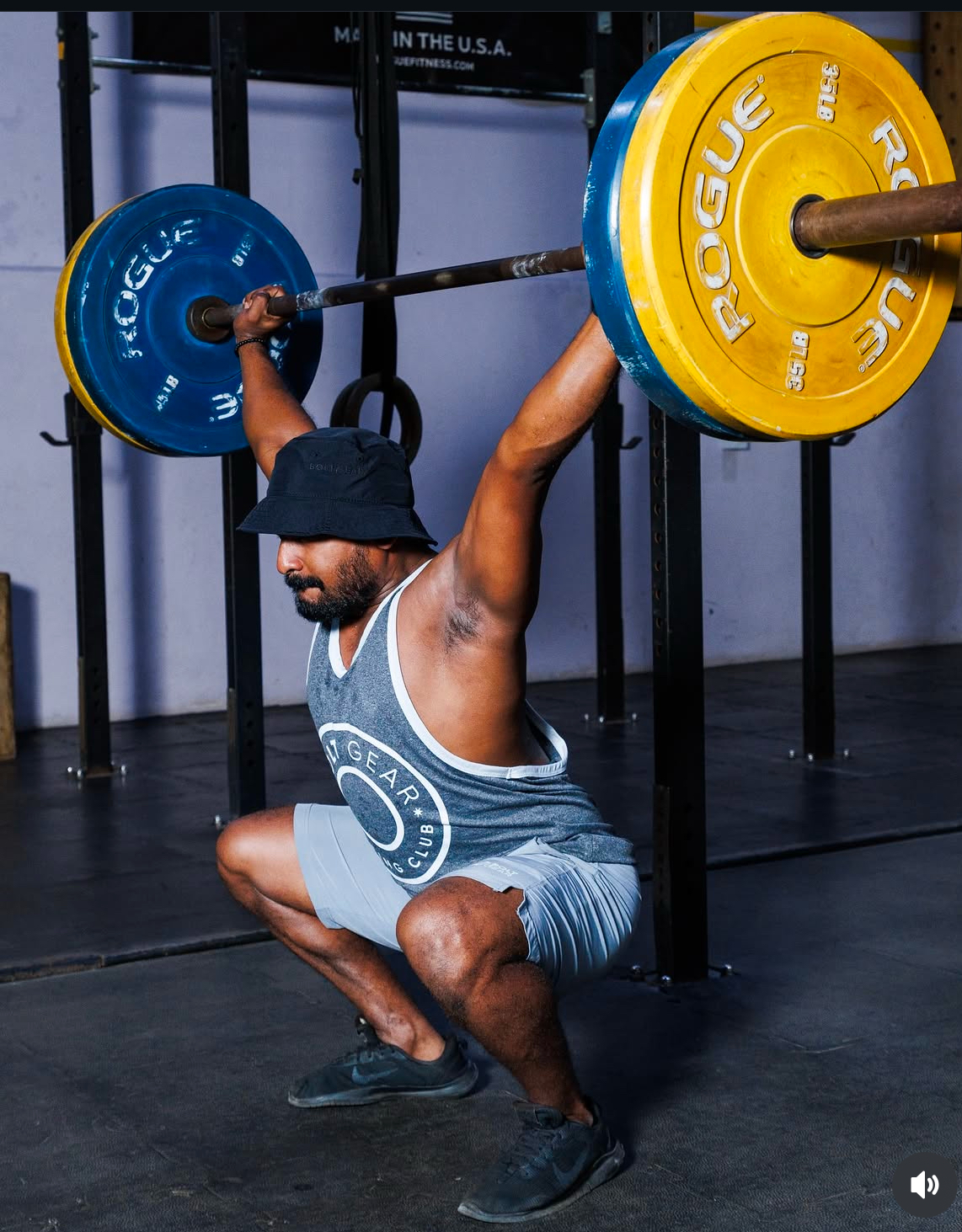 Nirash demonstrating an overhead squat